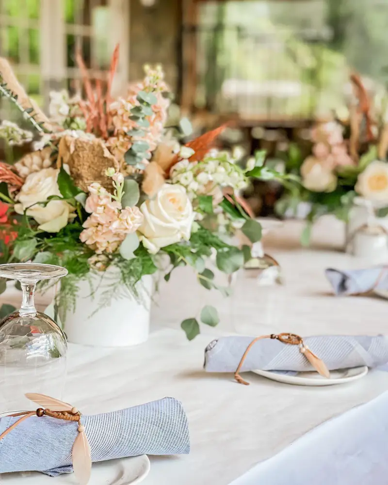Long tablescape with fresh florals and candles