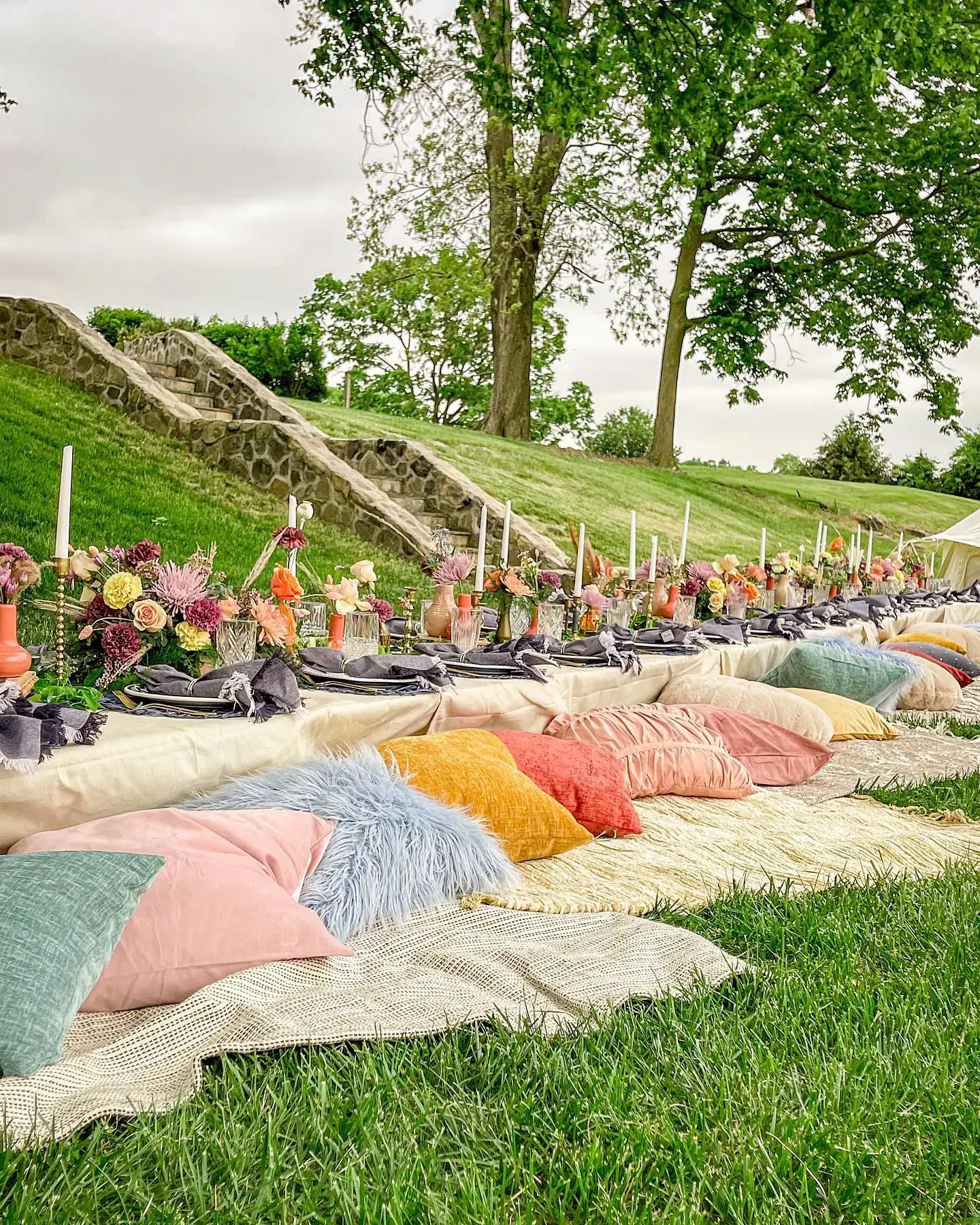 Hillside picnic, pillows and linen