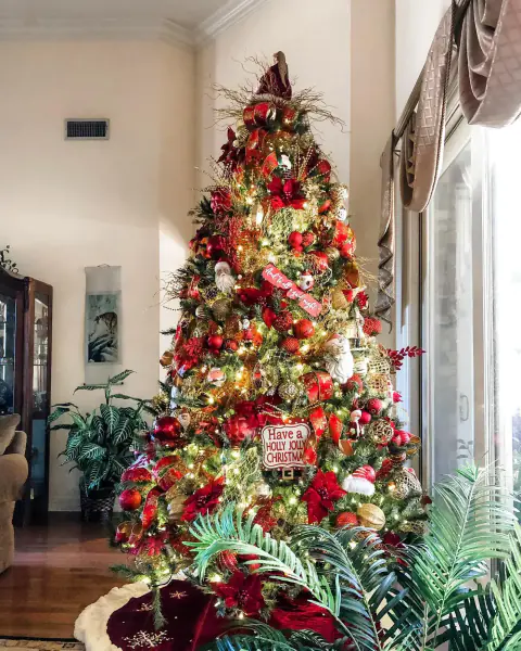 Red and green tree by the window