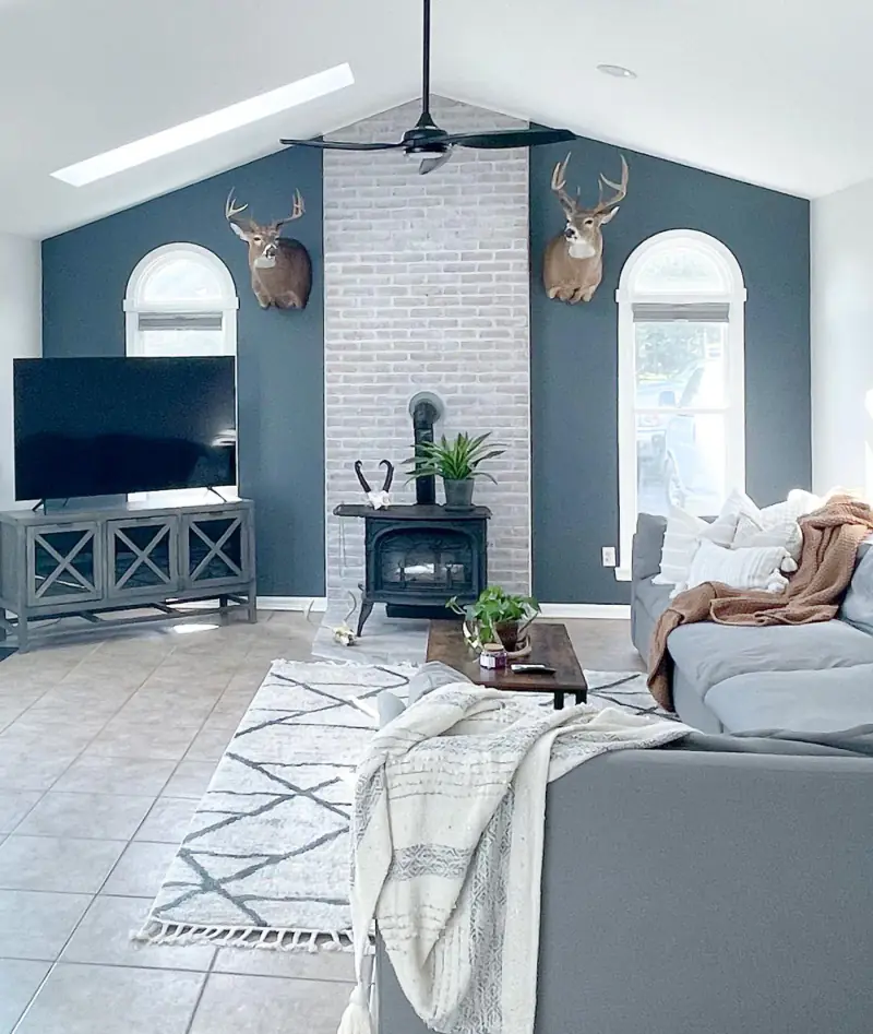 Living room with console and tufted chair